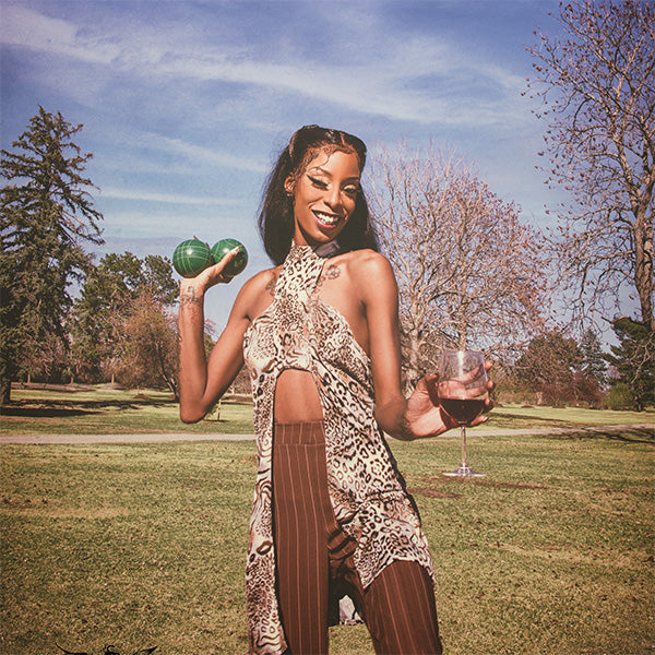 Animal Print Halter top with Brown Pinstriped Fitted Pants
